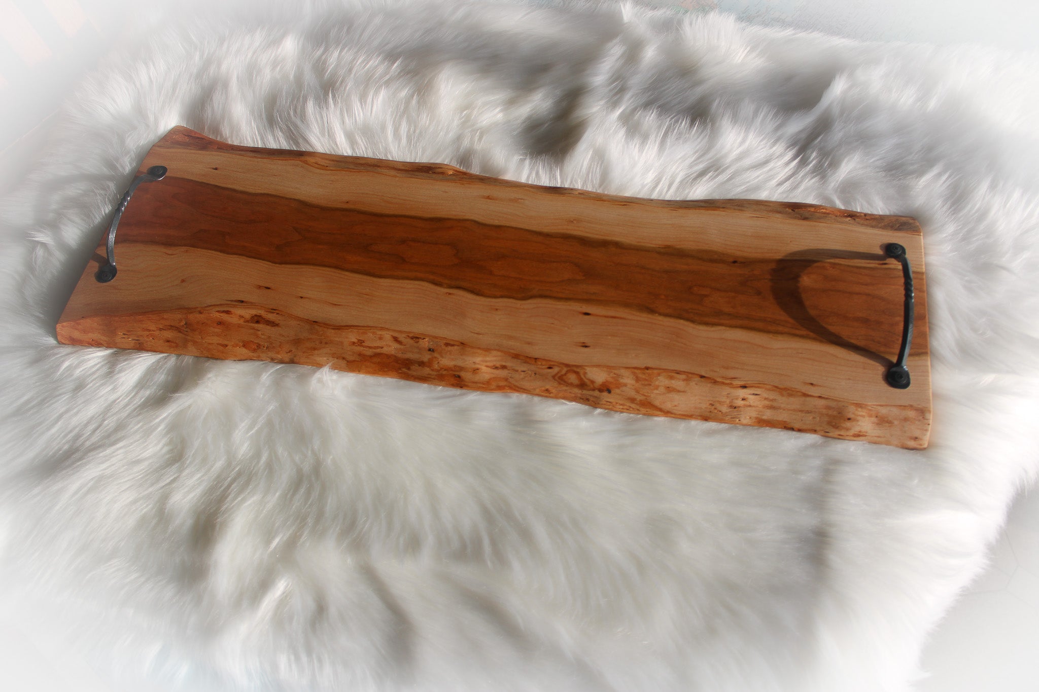 Cherry charcuterie cheese board serving tray with hand forged metal handles