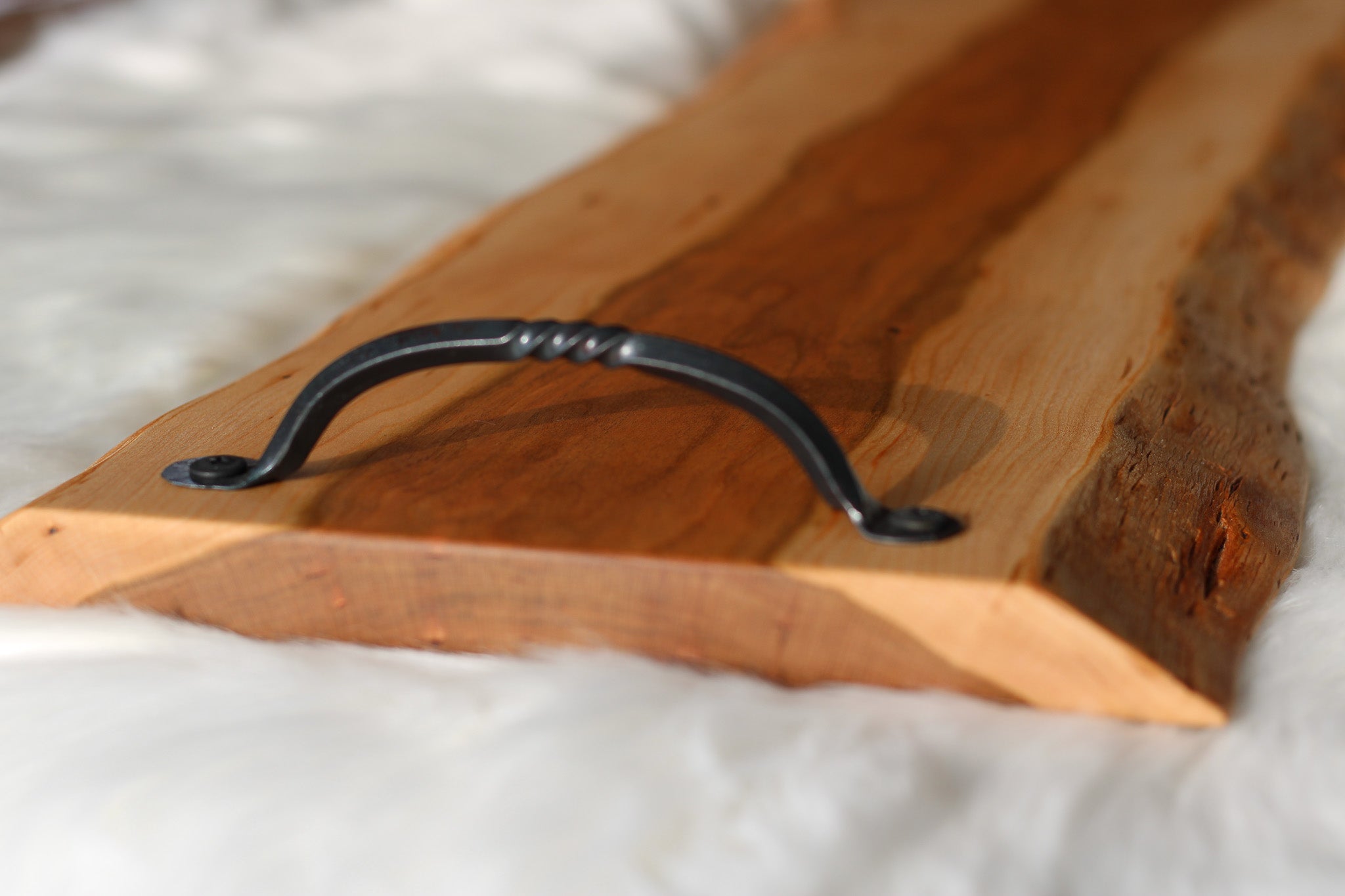 Cherry charcuterie cheese board serving tray with hand forged metal handles