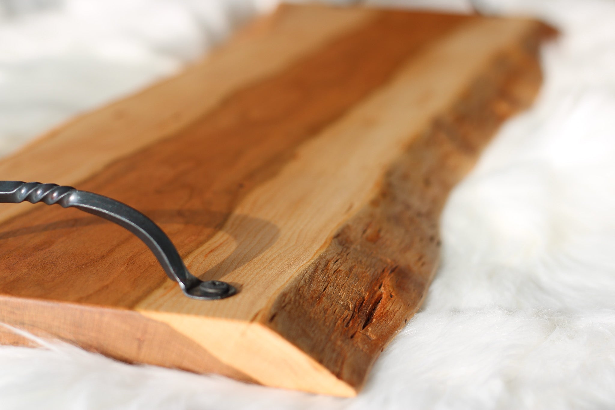 Cherry charcuterie cheese board serving tray with hand forged metal handles