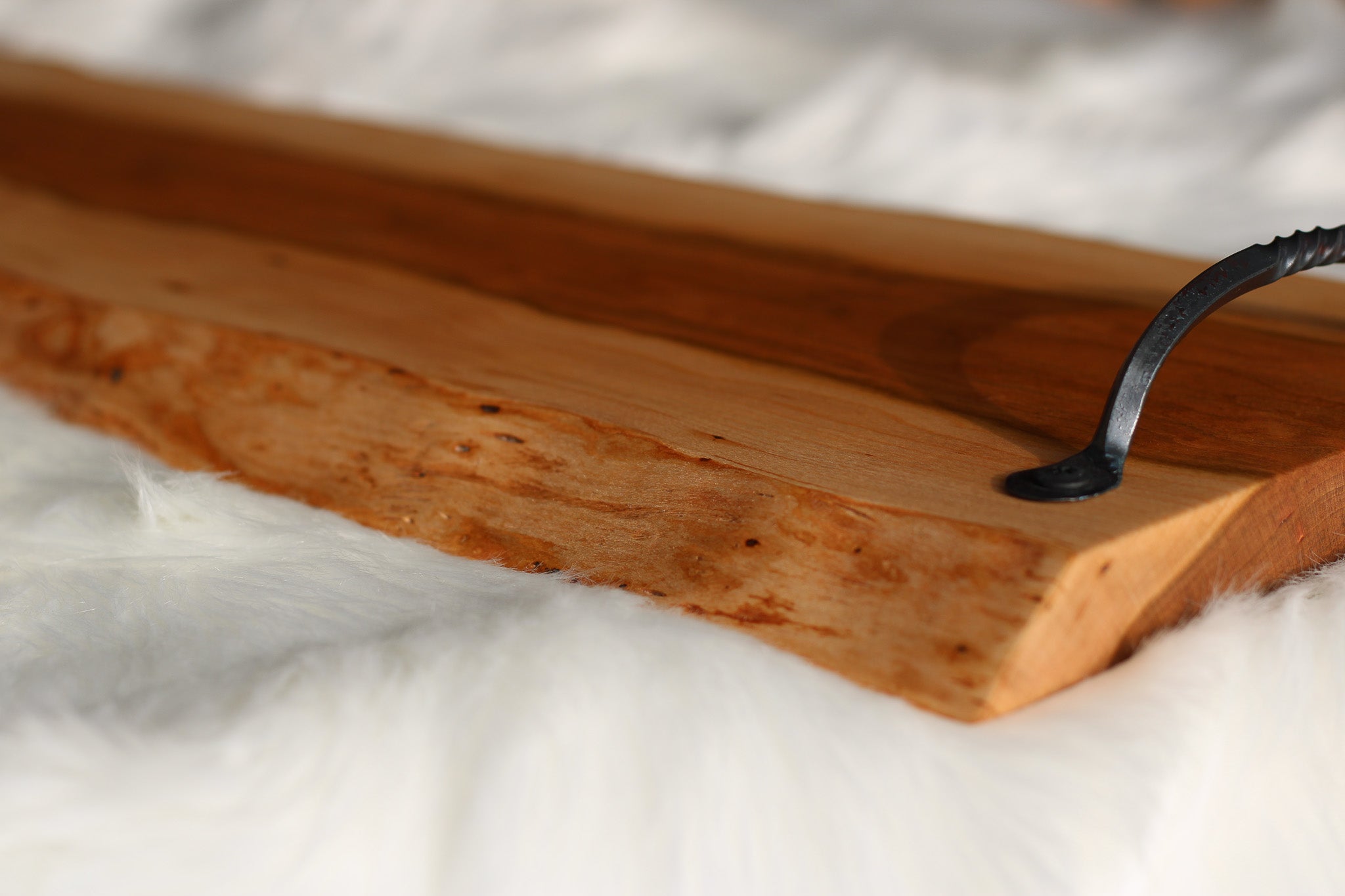 Cherry charcuterie cheese board serving tray with hand forged metal handles