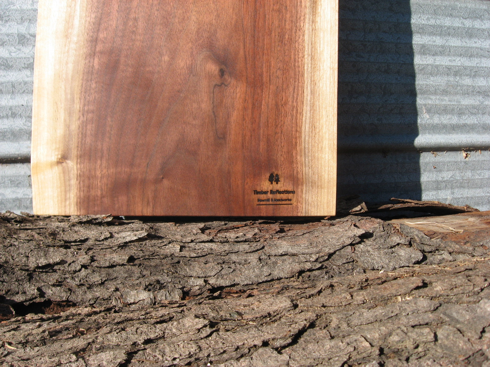 Black Walnut Charcuterie Board with Handle #3.  Logo pictured.