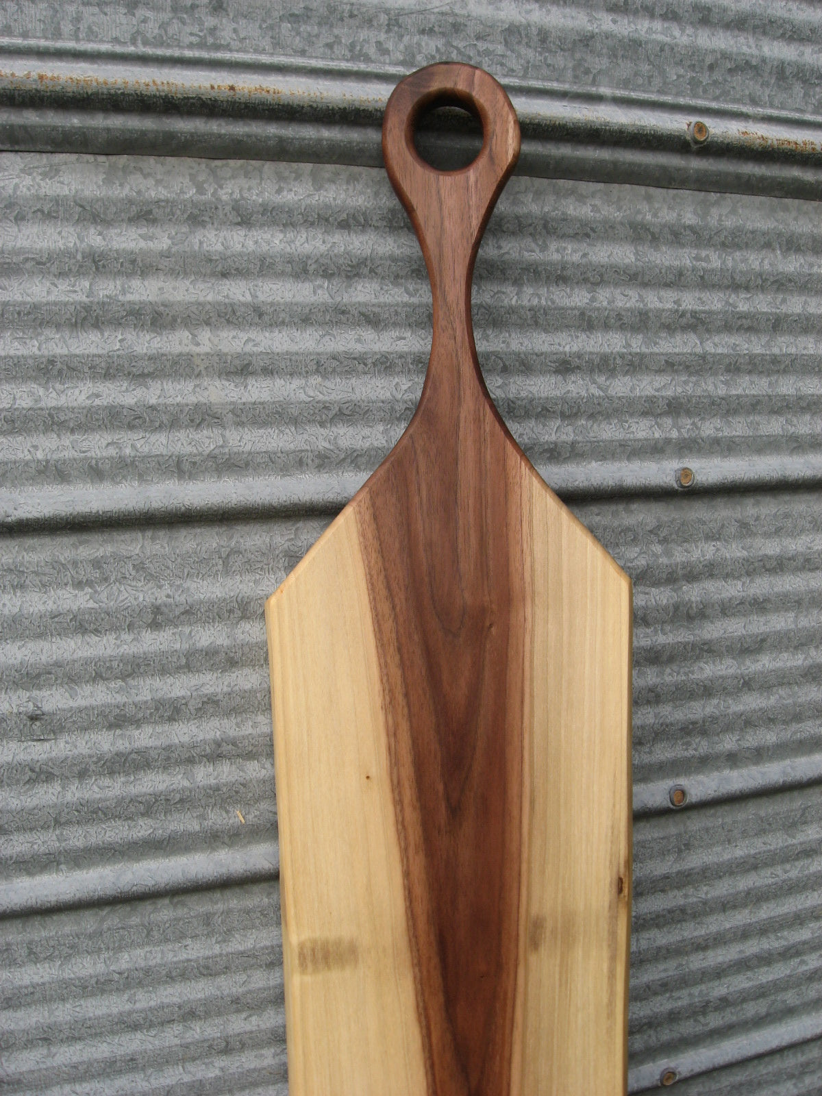 Black walnut charcuterie cheese board with handle.  Handle pictured.