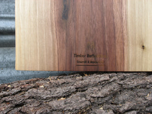 Black walnut charcuterie cheese board with handle.  Logo pictured.