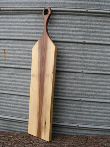 Black walnut charcuterie cheese board with handle.  Live edge pictured.