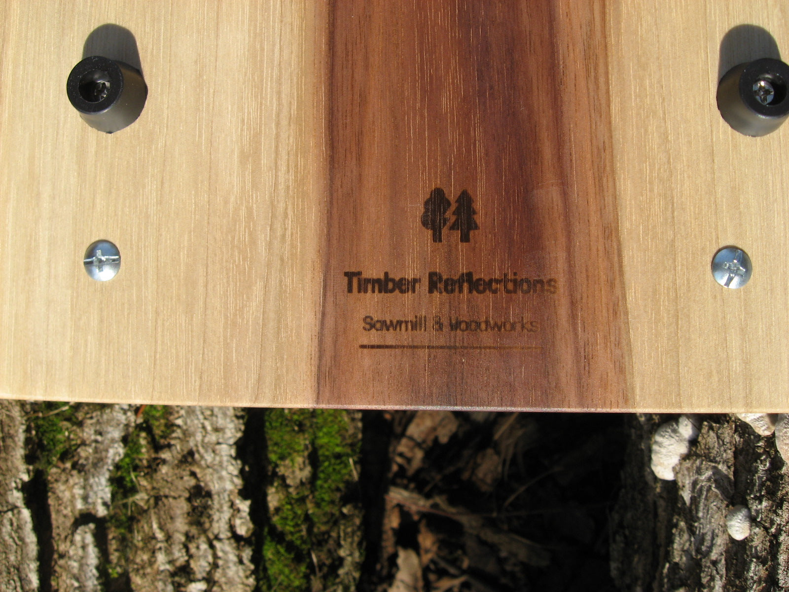 Live Edge Black Walnut Charcuterie Board Serving Tray with Black Metal Handles.  Logo on back pictured.