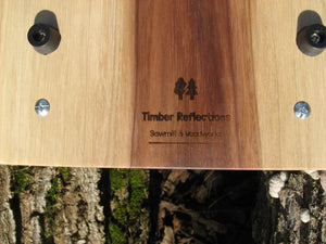 Live Edge Black Walnut Charcuterie Board Serving Tray with Black Metal Handles.  Logo on back pictured.