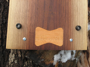 Live Edge Black Walnut Charcuterie Board Serving Tray with Black Metal Handles.  Inlaid cherry bowtie pictured.