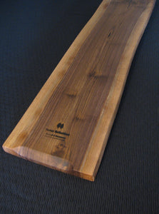 Live Edge Black Walnut Charcuterie Board.  Bottom with logo pictured.